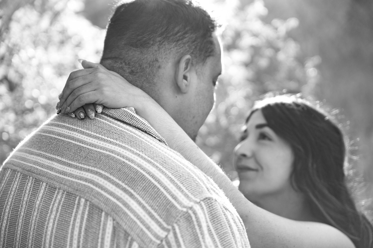 A couple looks at each other lovingly in Boise Idaho