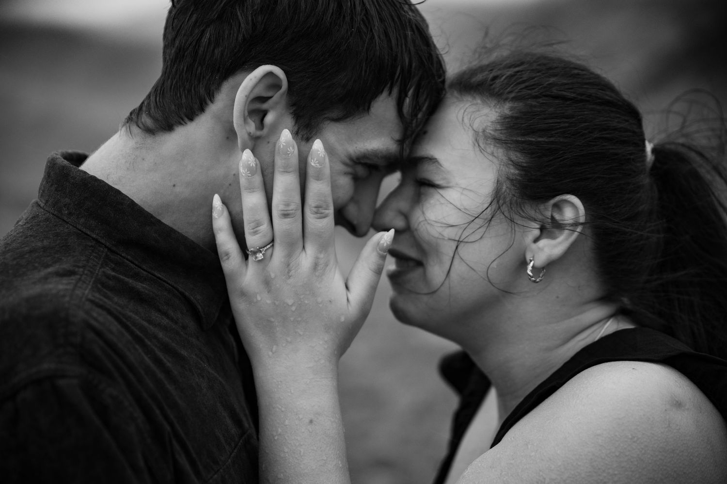 a couple during a rainy engagement shoot, boise idaho.