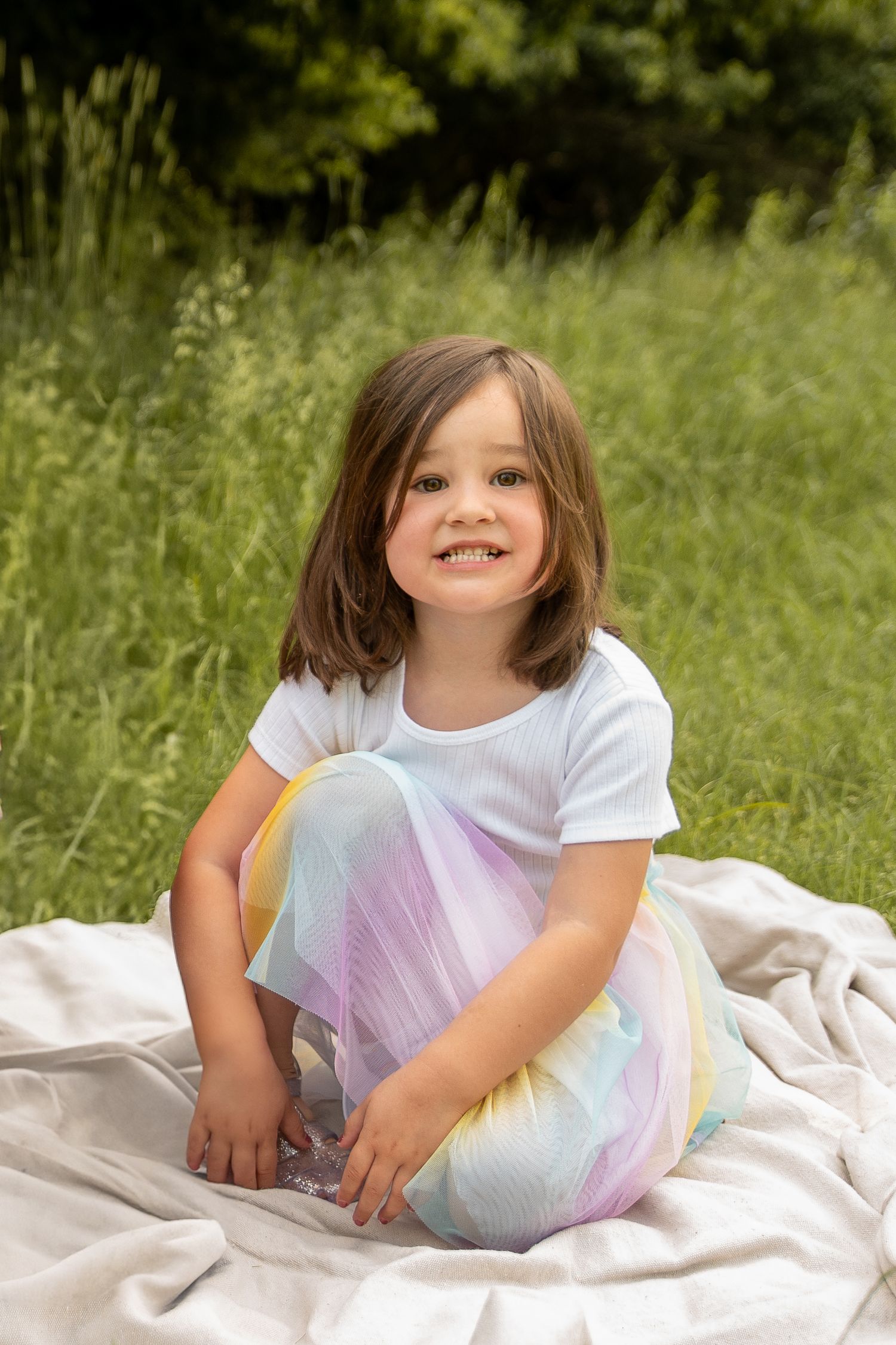a young girl smiling at the camera in boise idaho