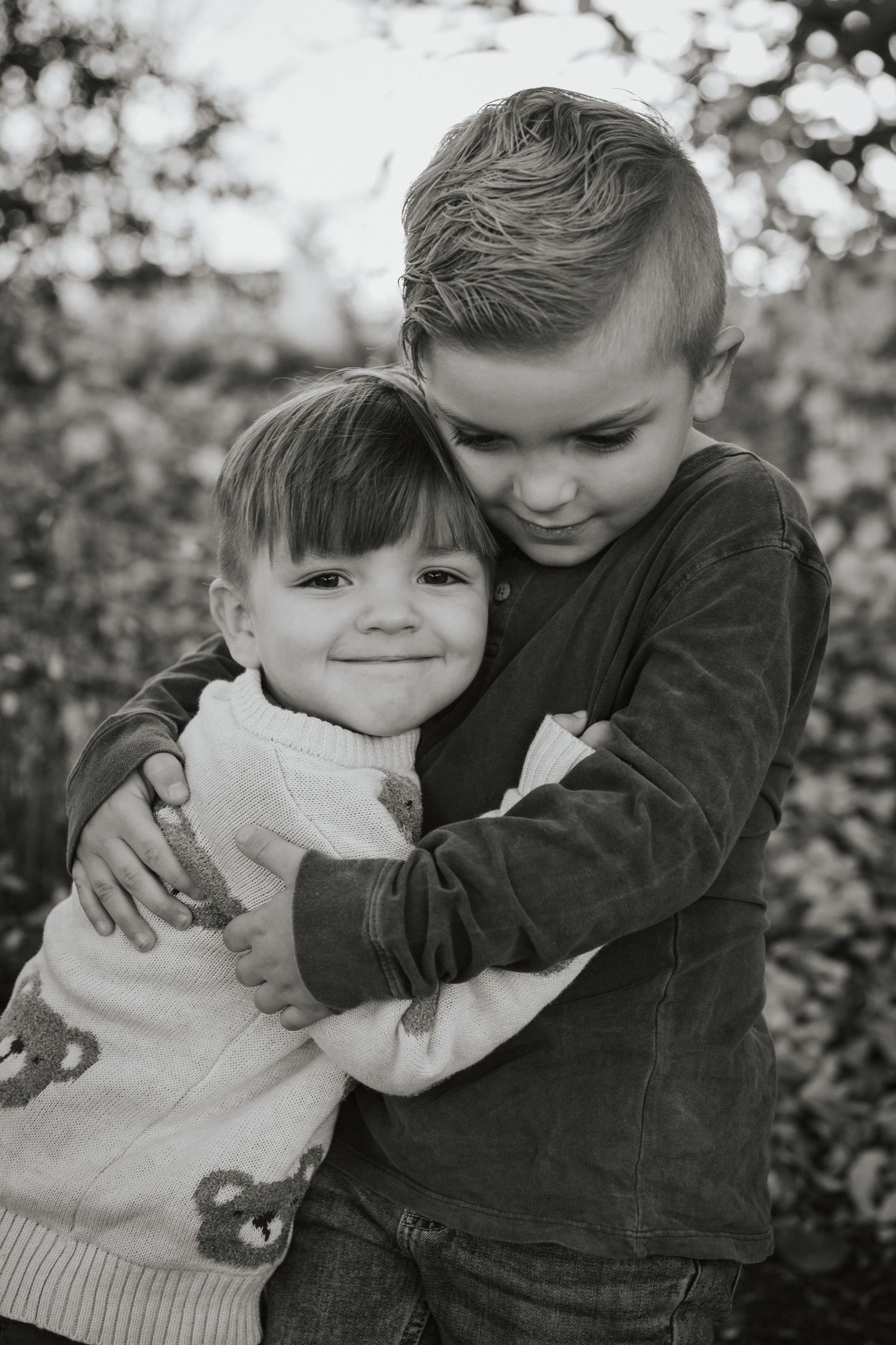 two brothers giving each other a hug in meridian idaho