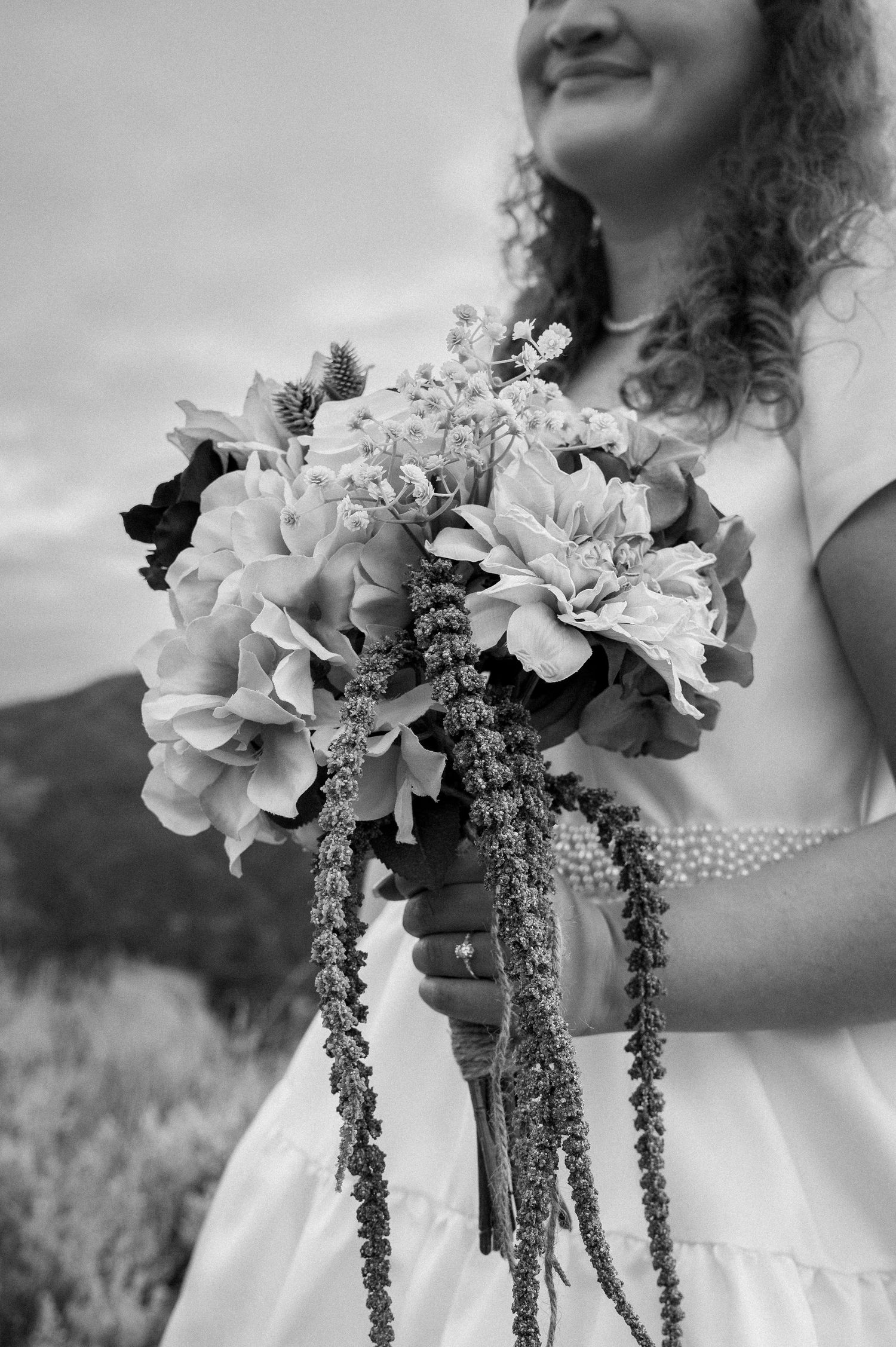 Beautiful detail shots of a bride's ring and flowers in Boise, Idaho.