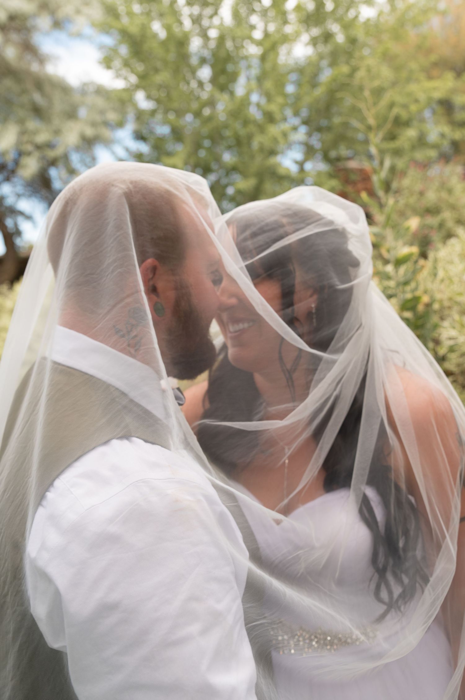 A bride and groom portrait under the veil in Boise, Idaho.