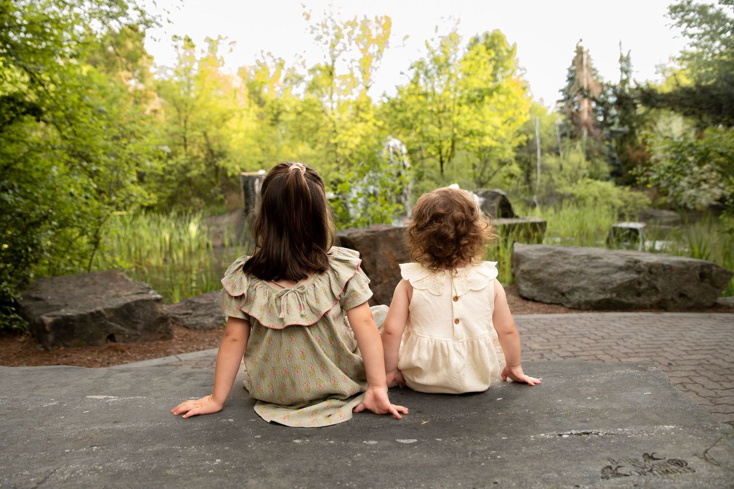 two sisters looking out at a waterfall in boise idaho
