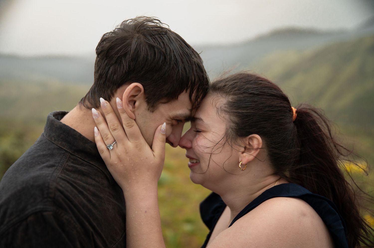 an emotional rainy image of an engaged couple in idaho