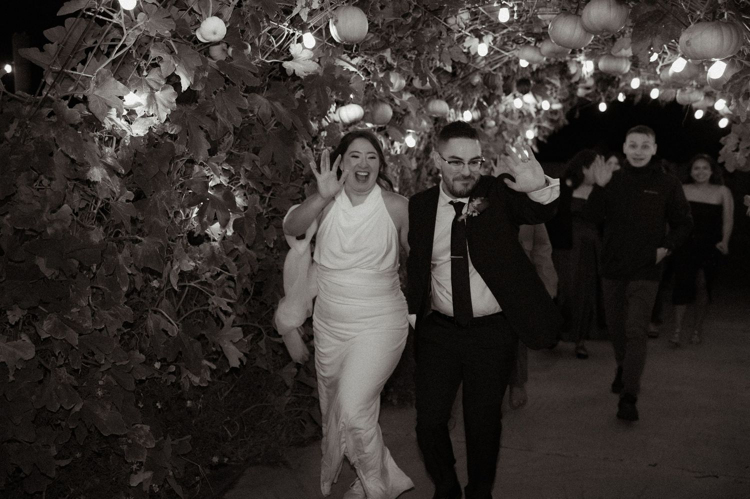 A newly married couple leaving their reception party in Eagle, Idaho at Good Life Farms