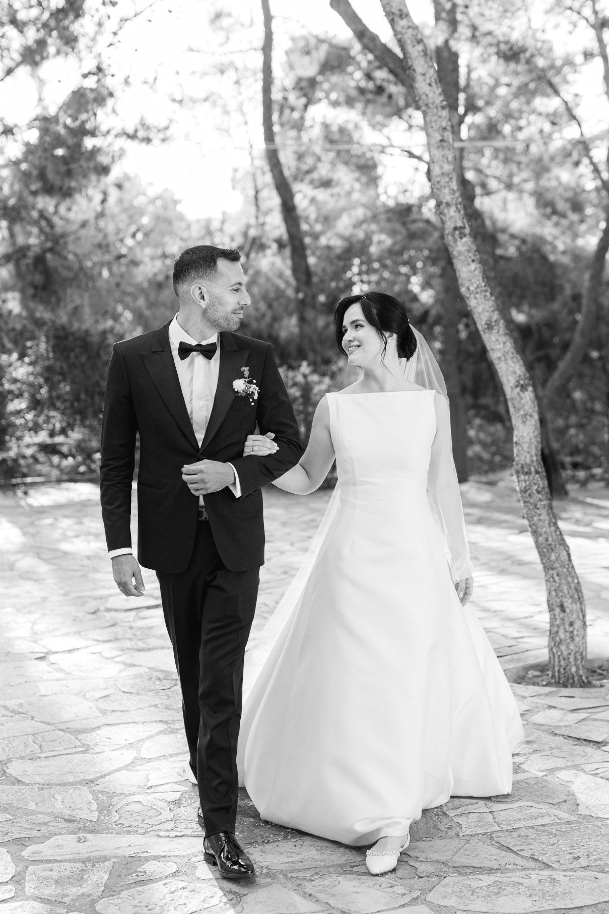 Editorial wedding photography in Greece with elegant natural light and romantic destination atmosphere