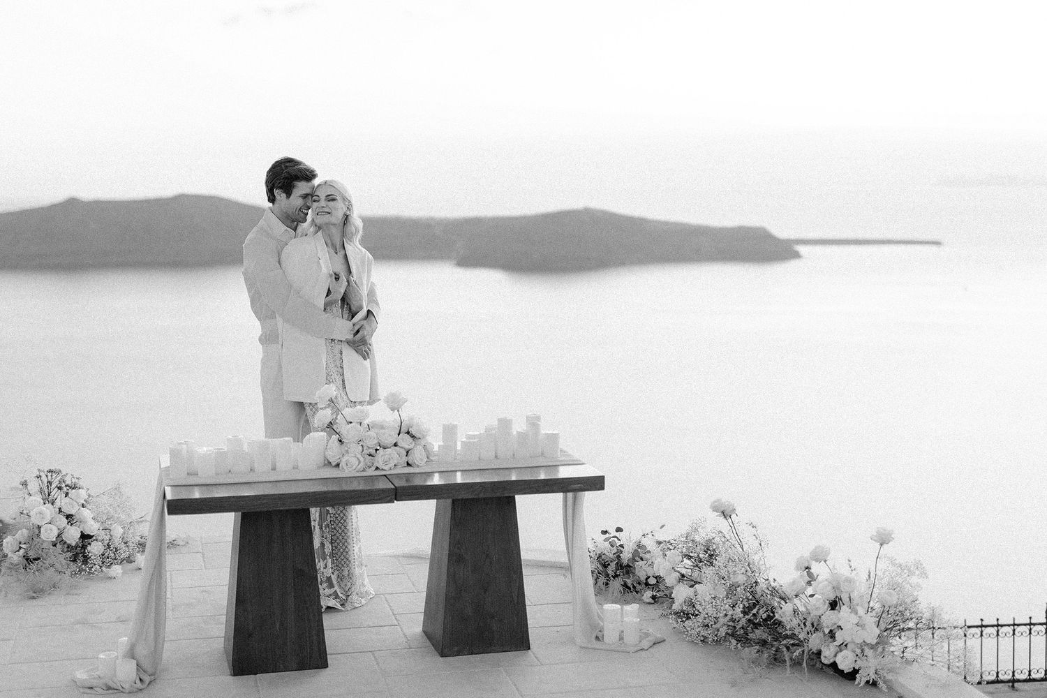 Destination wedding couple portrait at golden hour in Santorini Greece, captured with an editorial eye.