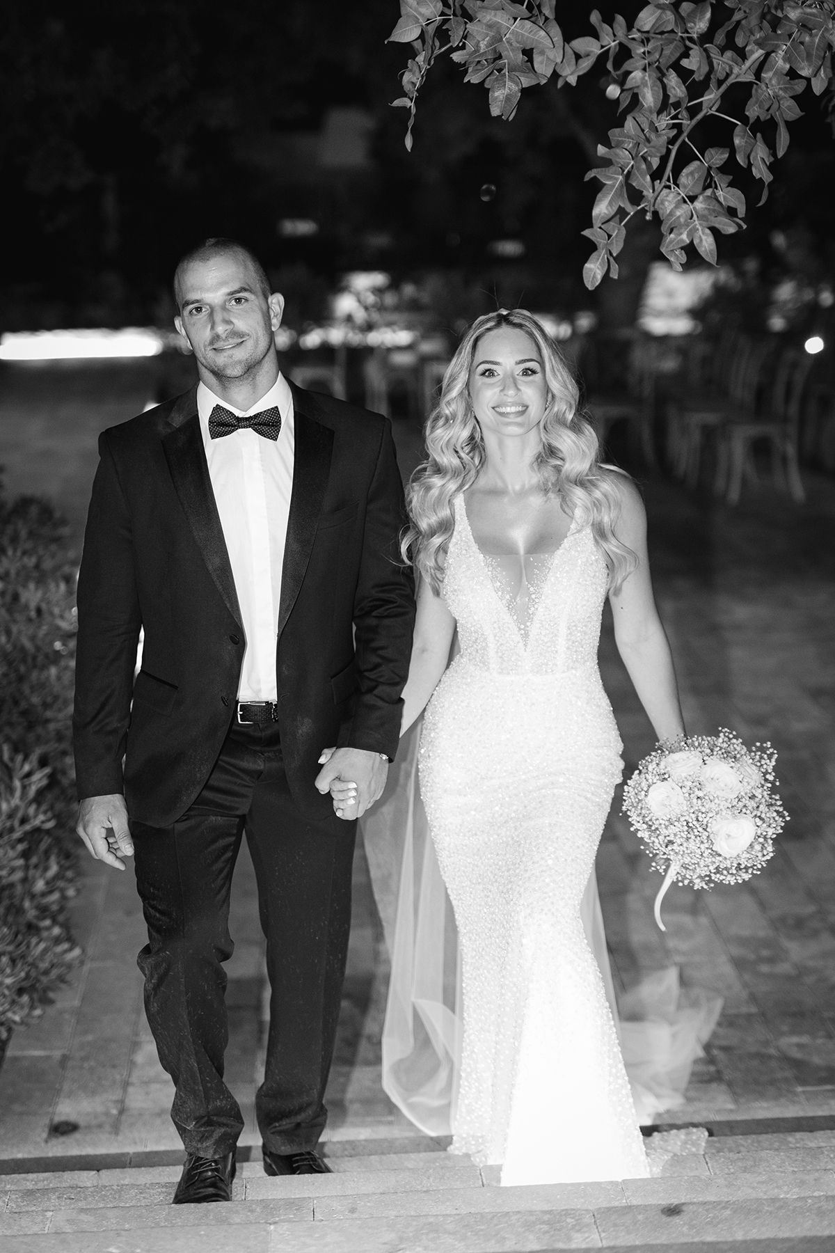 Fine art editorial couple portrait in Greece with refined composition and natural emotion.