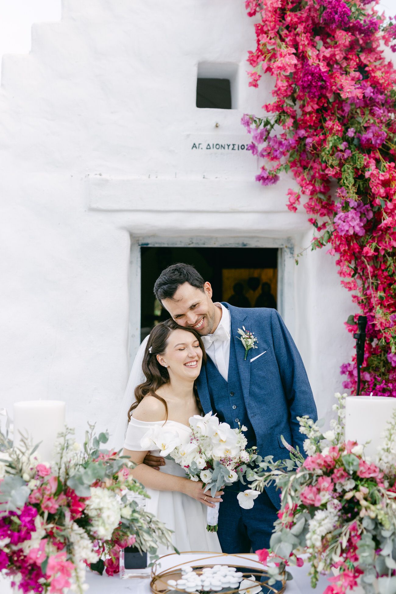 Bride and groom by the sea during an Island Art & Taste wedding on the Athens Riviera, Greece.