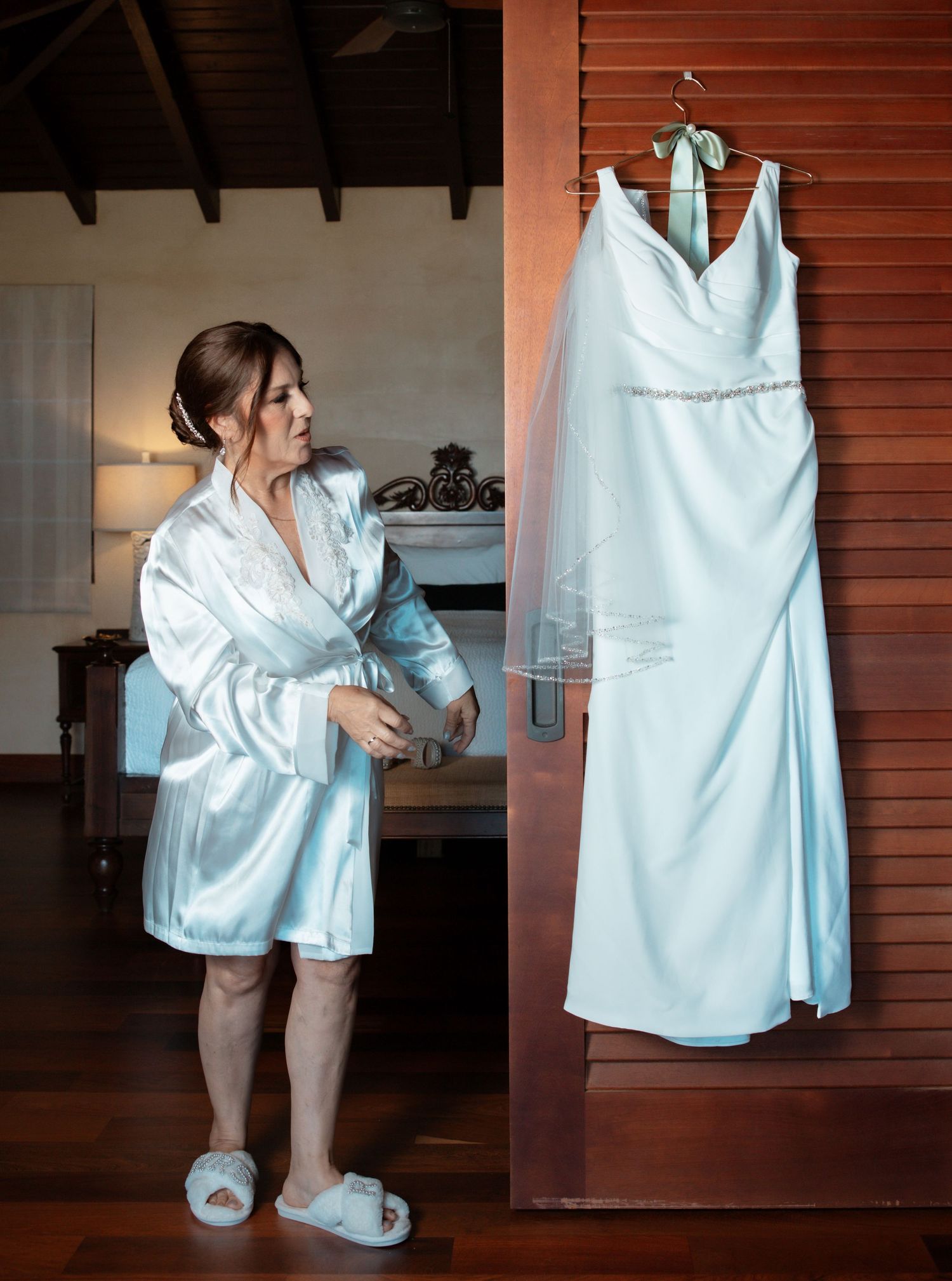 A collage of photos showing someone wearing a white satin robe and fuzzy slippers in various casual indoor poses.