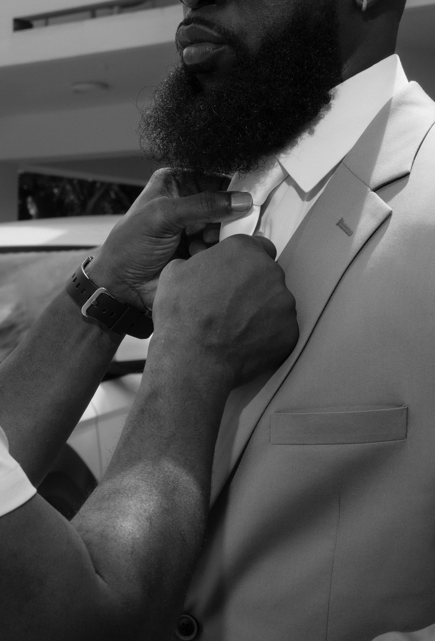 Black and white close-up images show a person in a light colored suit jacket drinking from a glass in sequence.