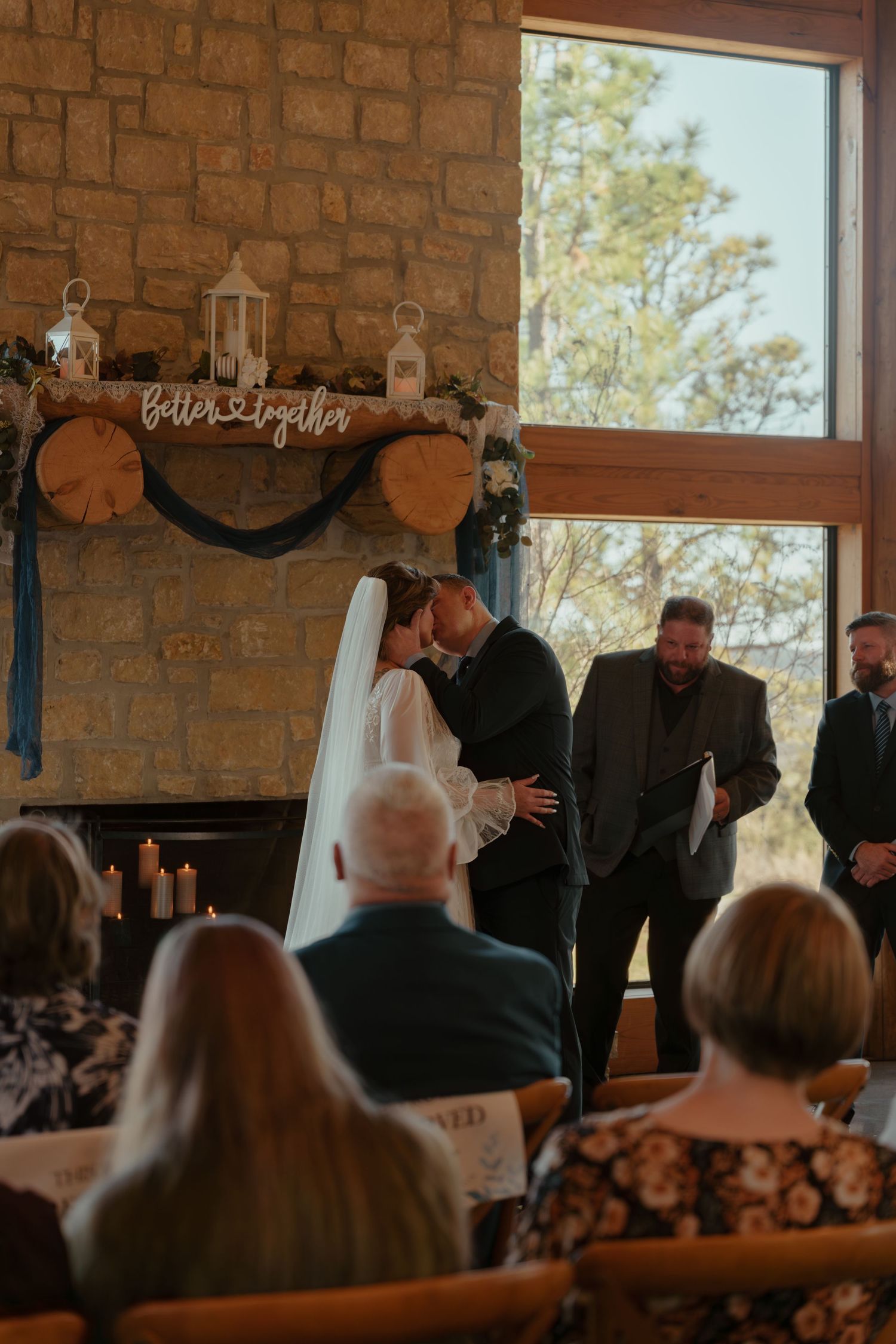 A series of connected photos showing a wedding ceremony taking place inside a rustic stone-walled venue.