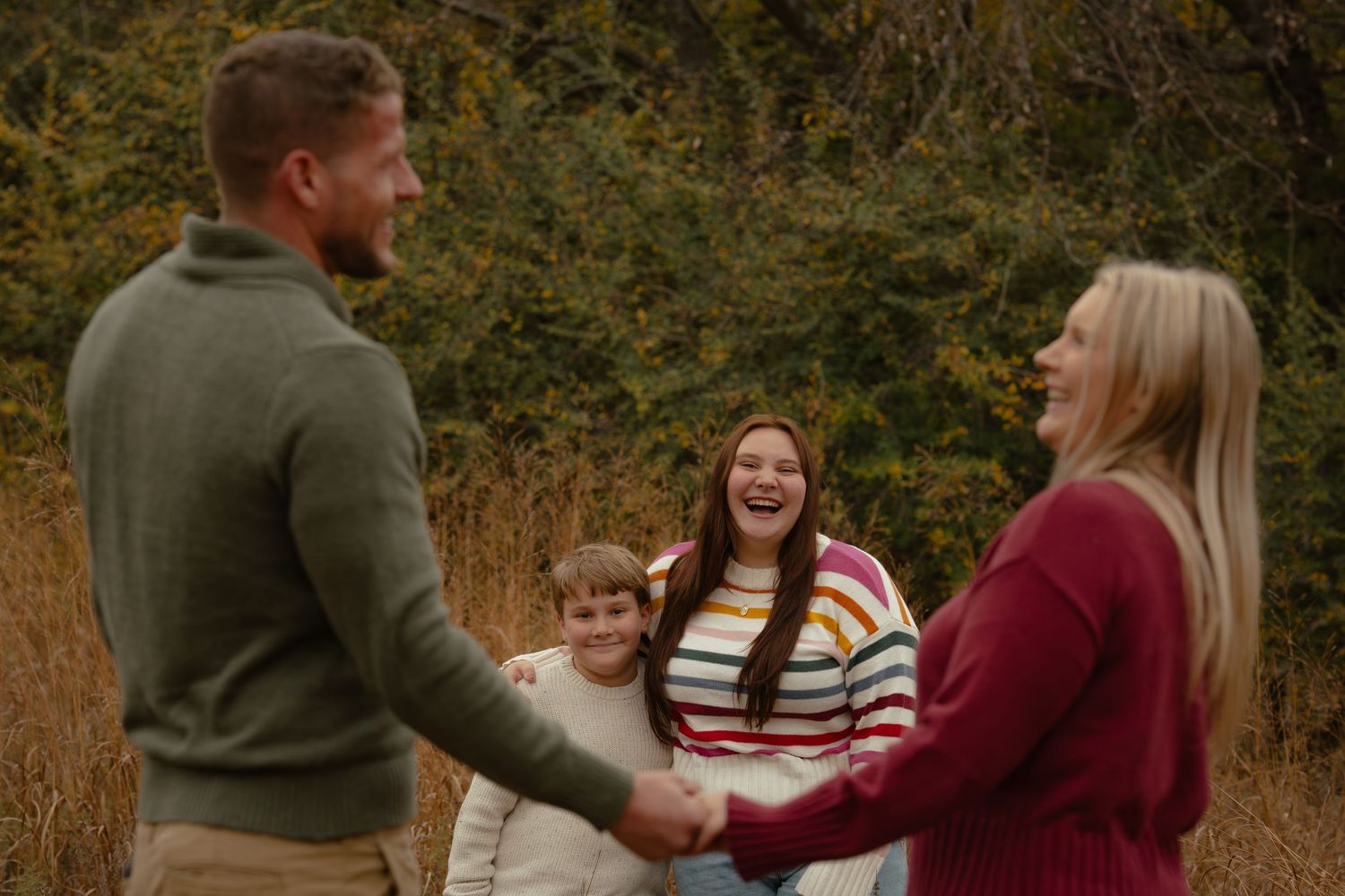 Candid family moments captured in a series of warm autumn portraits.