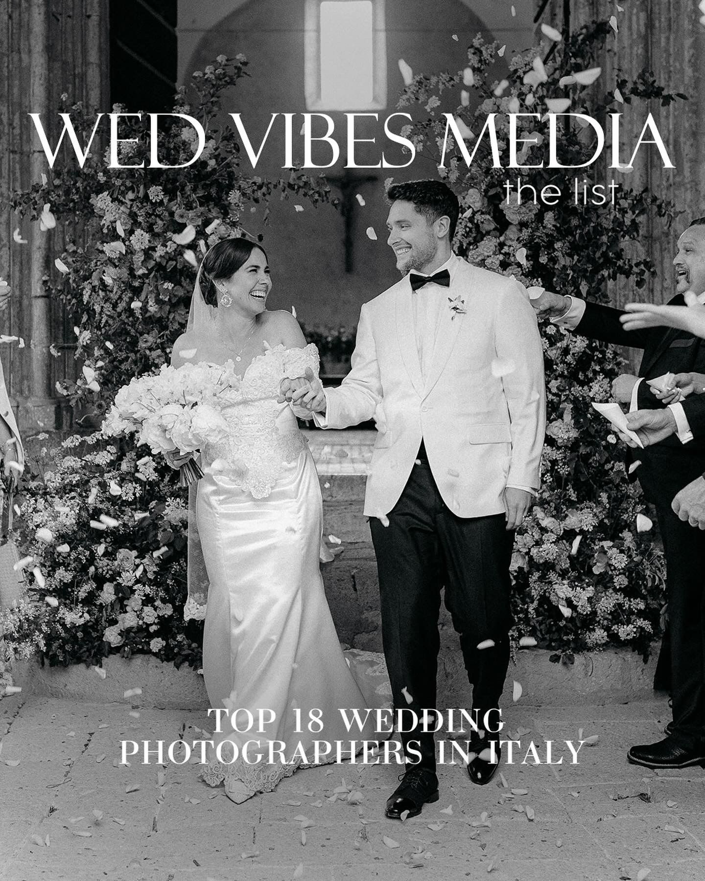 Black and white photo of a bride and groom walking through confetti, featured in Wed Vibes Media top 18 wedding photographers in Italy.