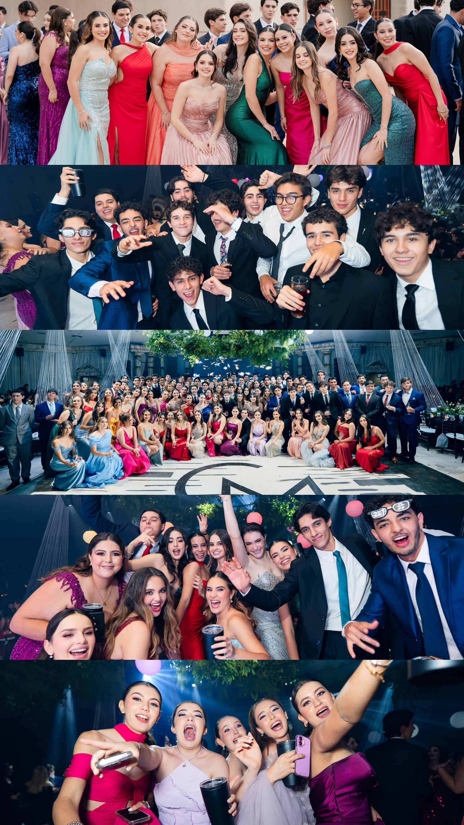 Large group of students celebrating at a formal dance event wearing colorful dresses and suits.