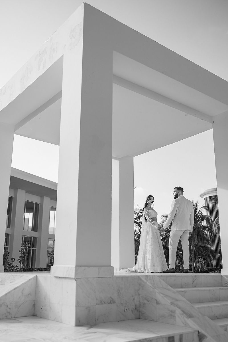 Black and white view of modern resort architecture at Majestic Elegance Costa Mujeres.