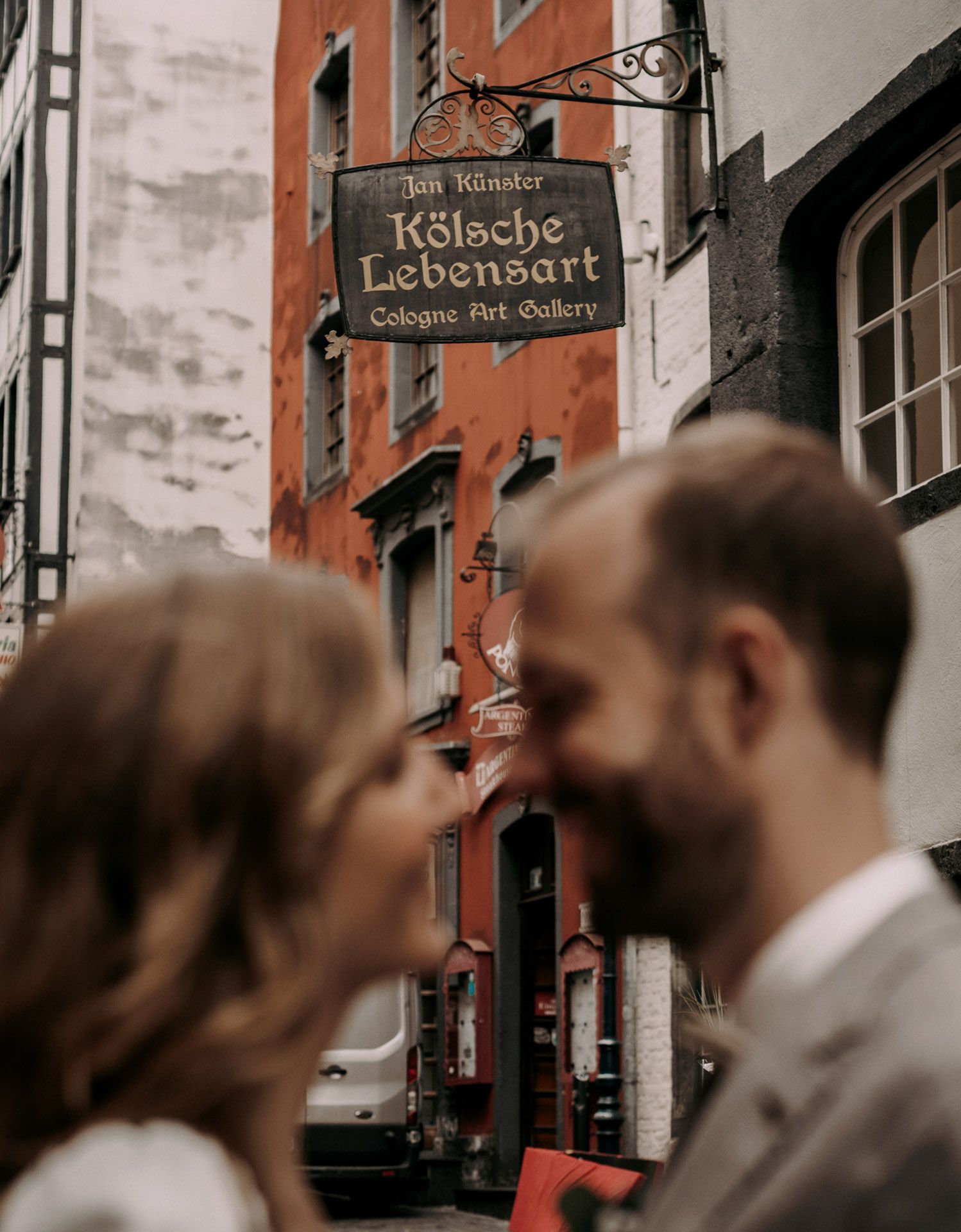 A romantic street scene in Germany with vintage signage.