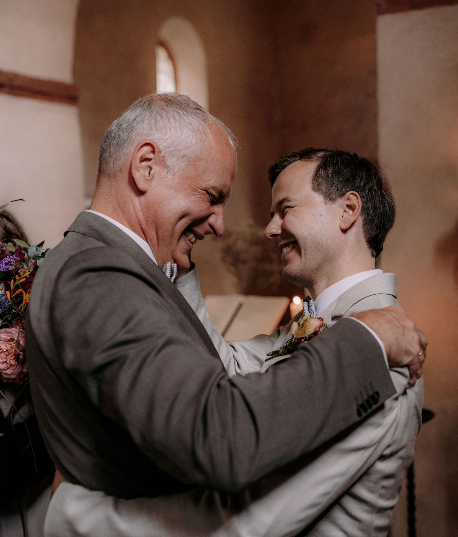 A heartwarming embrace shared during an intimate wedding celebration.