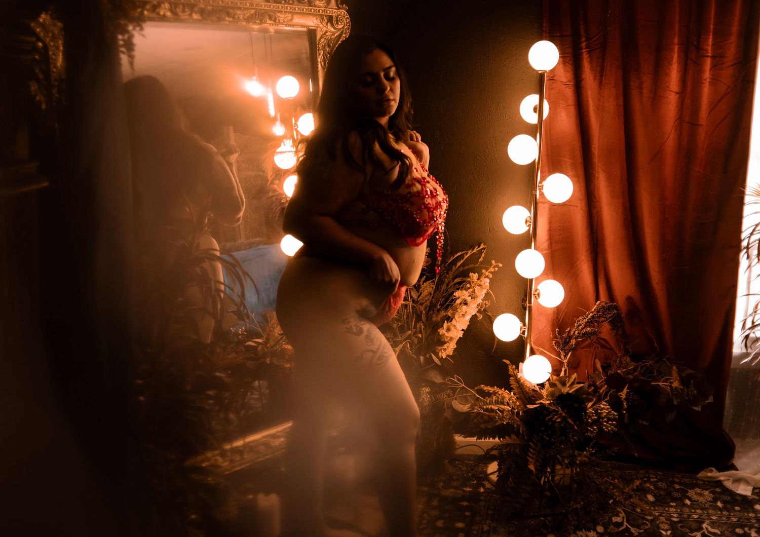 A moody, fine art boudoir photo designed to celebrate your power, grace, and individuality. Boudoir session with body jewelry, las Vegas