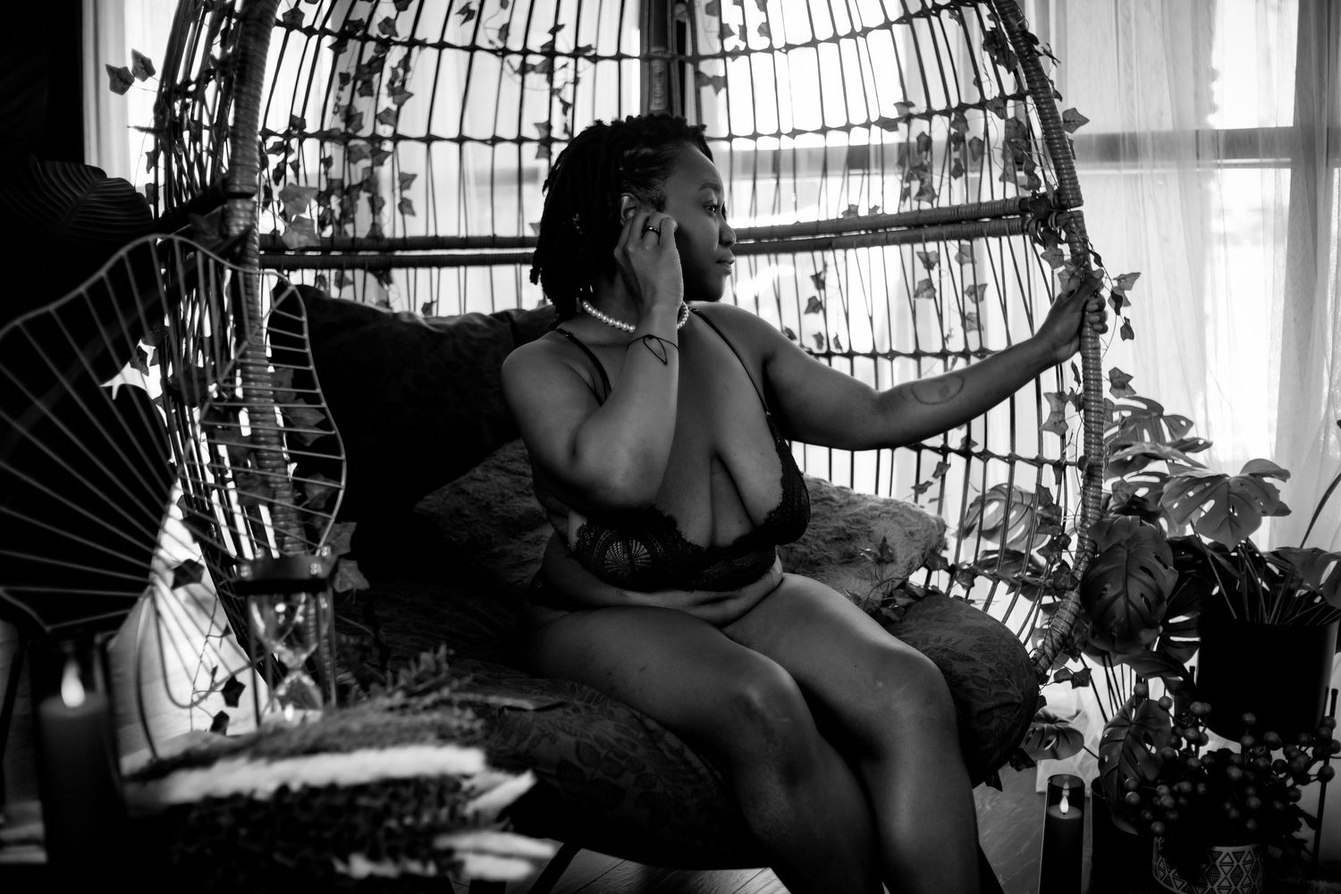 Empowering dark and moody boudoir portrait highlighting natural beauty and confidence. Las Vegas boudoir photographer with private studio.