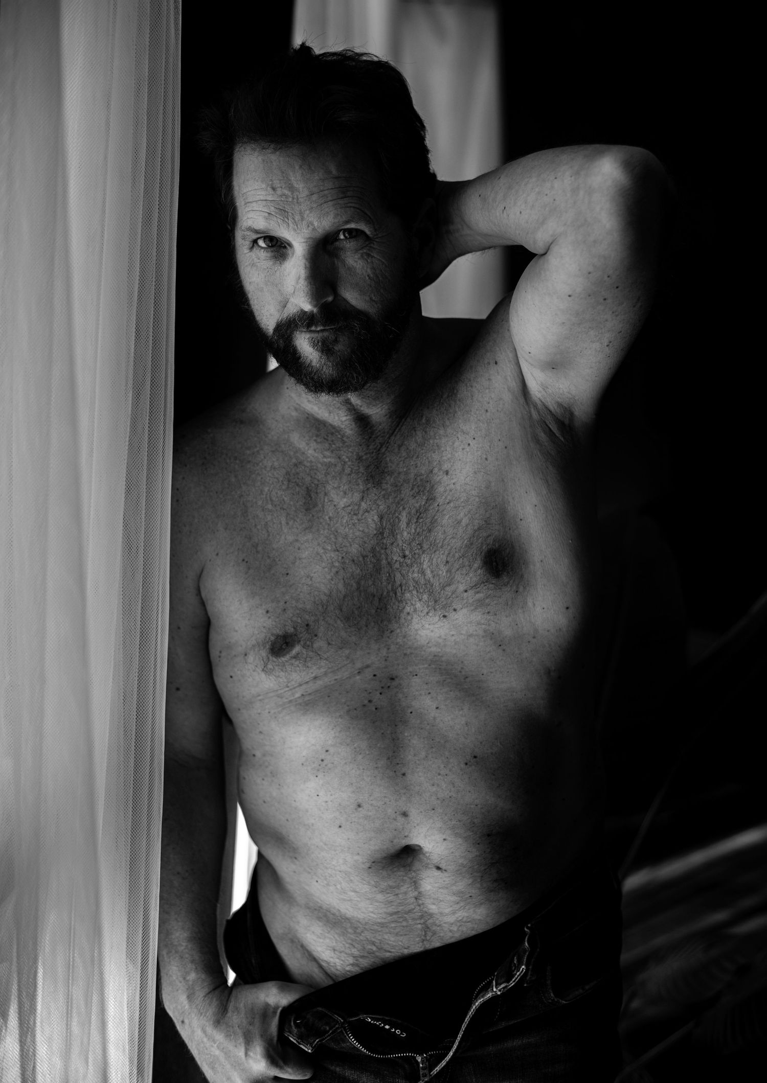 Empowering dudeoir photography in Las Vegas celebrating masculine energy through luxury and emotion. empowering dudeoir sessions for men