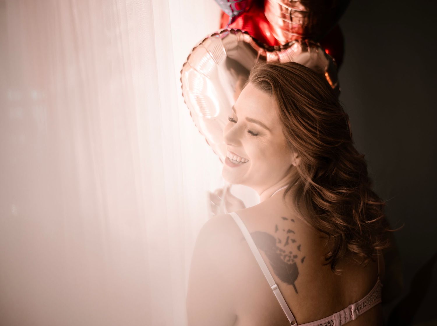 Birthday Empowering boudoir photo celebrating natural beauty & bold self-expression in a dark, refined style. Las Vegas Boudoir photographer
