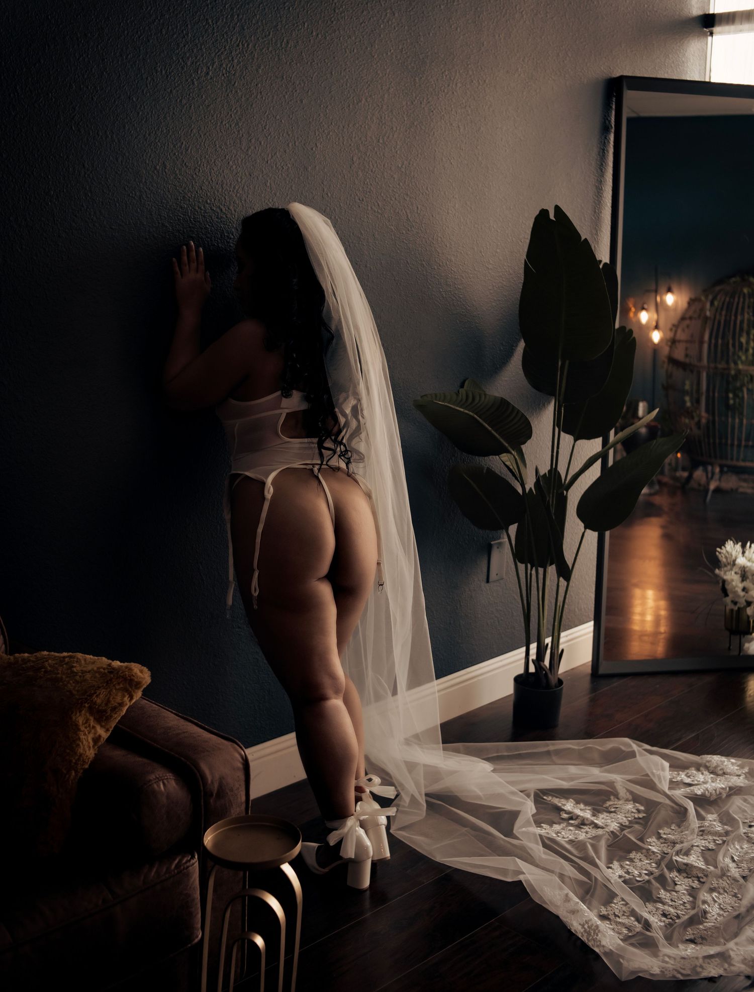 Dark and moody bridal boudoir portrait by Las Vegas photographer Foxy Moon, capturing elegance, emotion, and confidence.