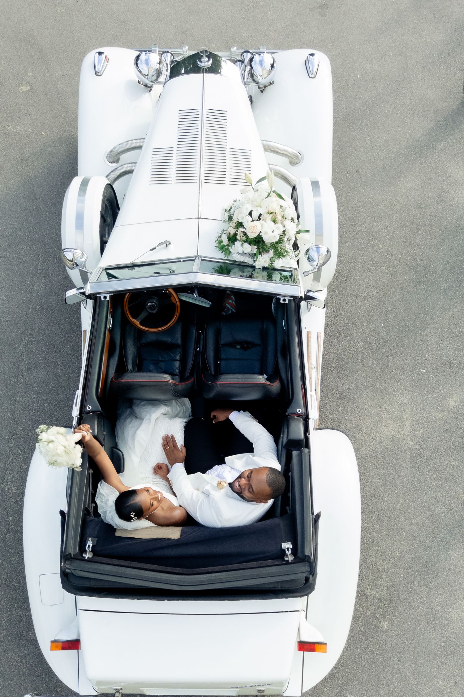 Aerial view of people sleeping inside a white car with open sunroof and doors arranged in a creative photo series.