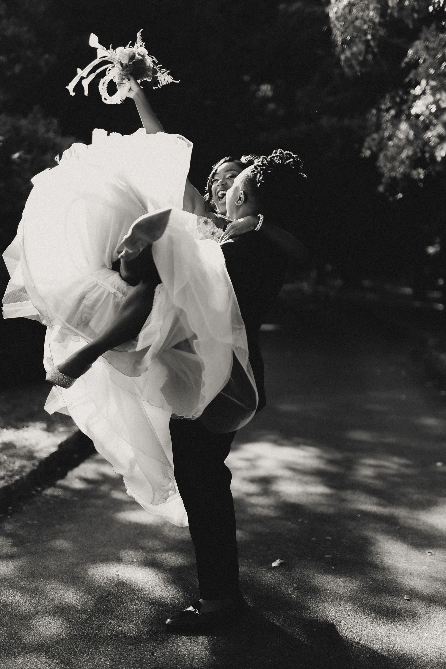 A romantic black and white photo sequence shows a couple dancing together in dappled sunlight outdoors.