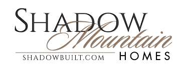 Shadow Mountain Homes logo with classic serif and script fonts above the shadowbuilt.com URL.