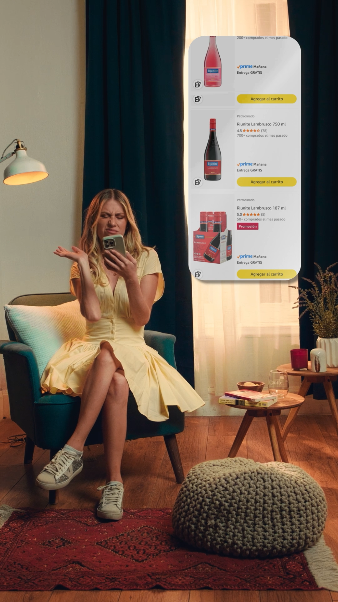 Blonde woman in yellow dress reacting to Riunite wine products displayed on shopping app on phone.