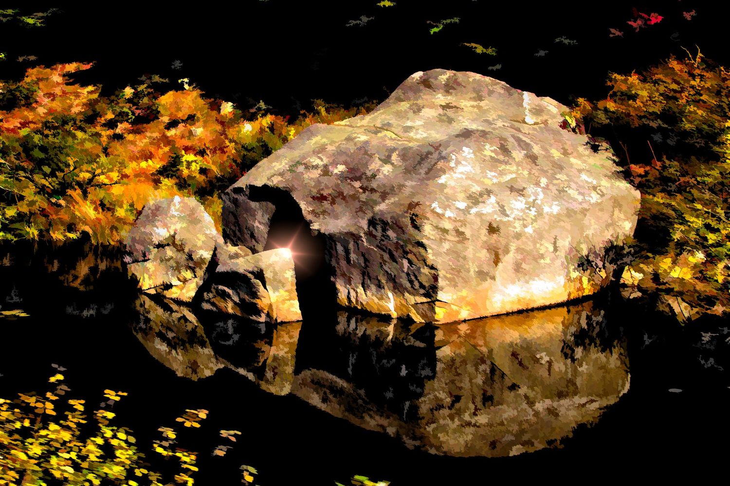 An illuminated rock reflected in a dark still pond surrounded by colorful autumn foliage at night.