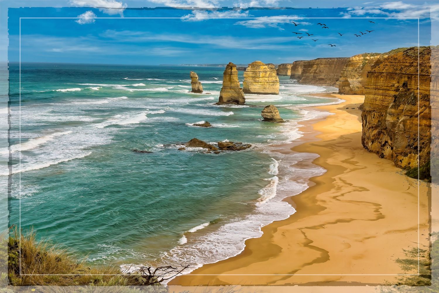 Twelve Apostles limestone sea stacks along the rugged Great Ocean Road coastline in Australia.
