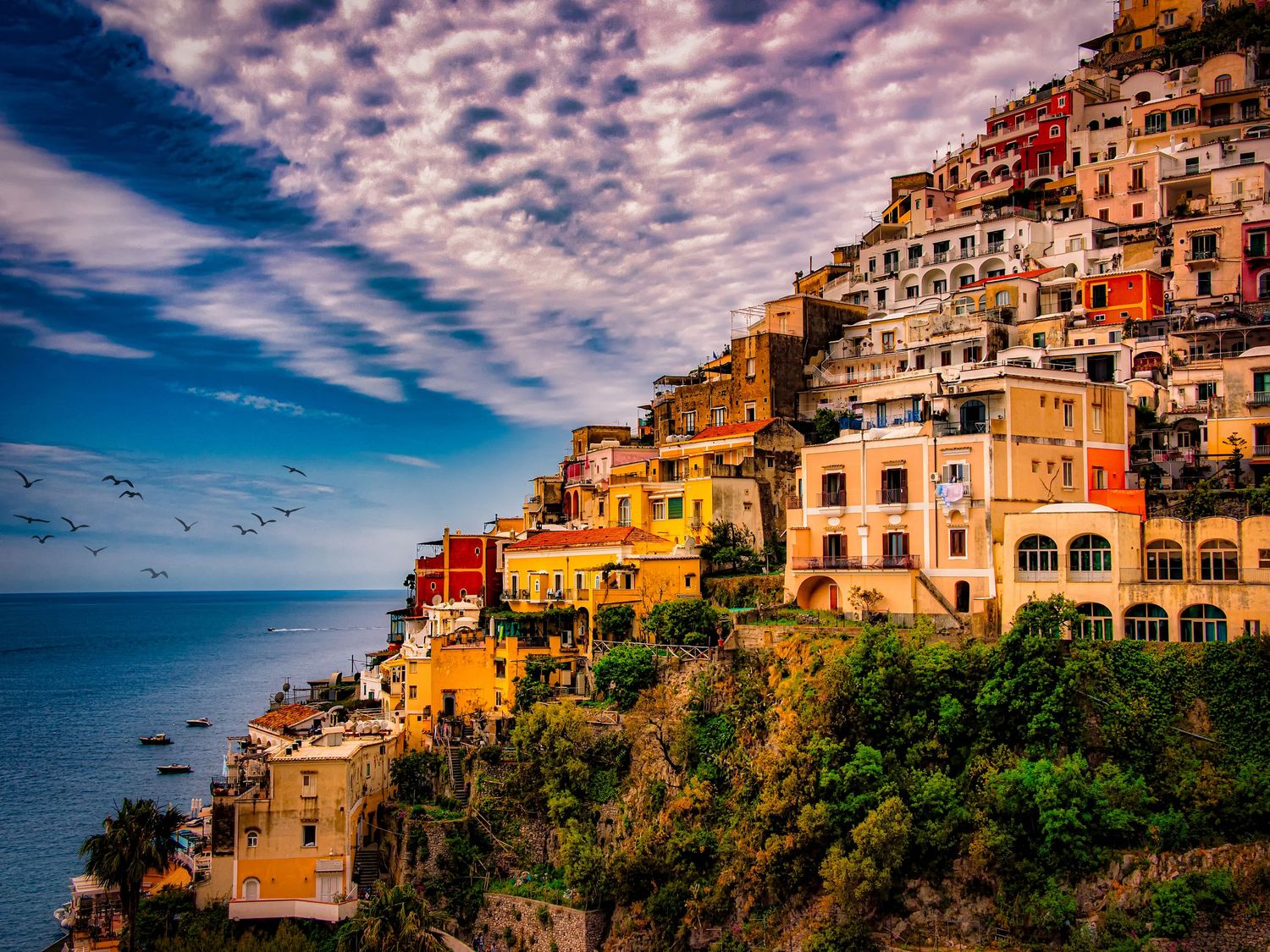 Colorful hillside buildings of Positano on the Amalfi Coast overlooking the Mediterranean Sea, Italy.