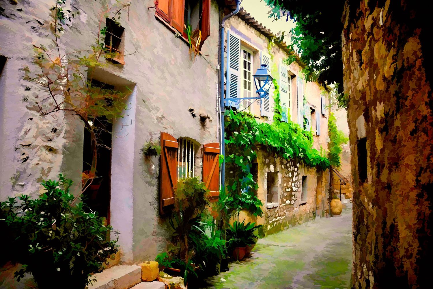 Quaint narrow street in a French village with colorful shutters, ivy-covered stone buildings.