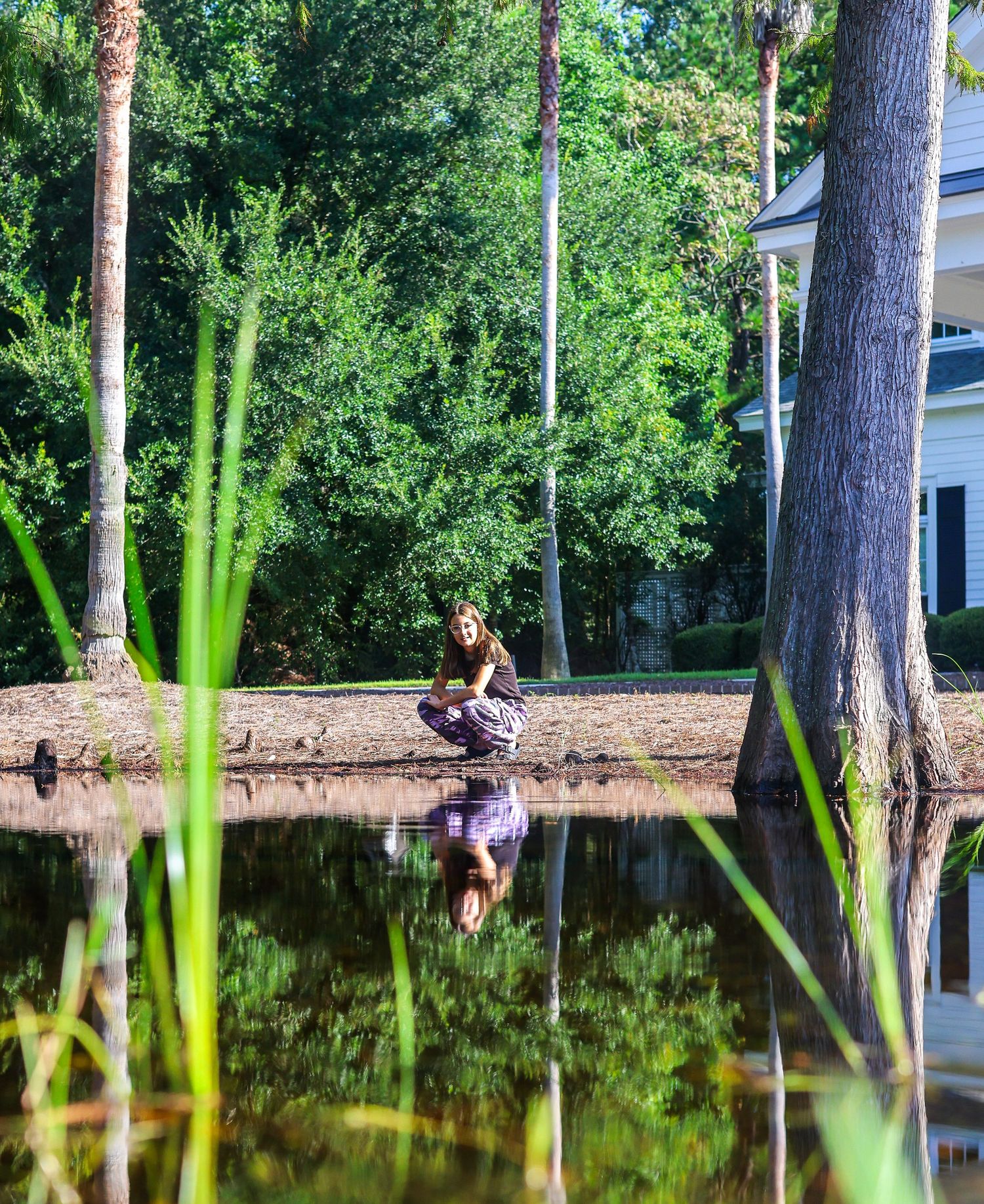 girl with reflections in the water