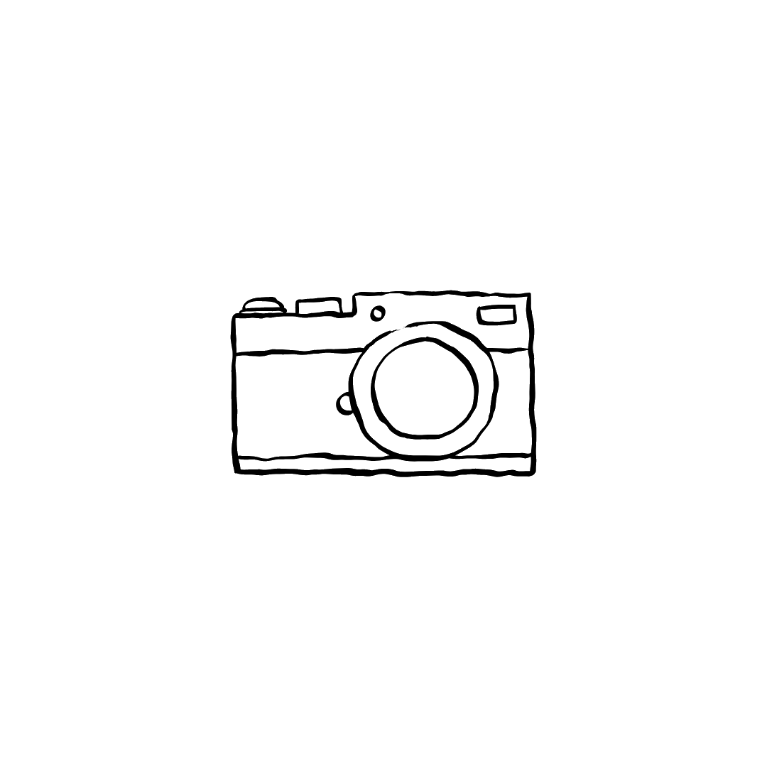 Hand-drawn doodle sketch of a vintage retro film camera with lens, simple black outline illustration on white background.