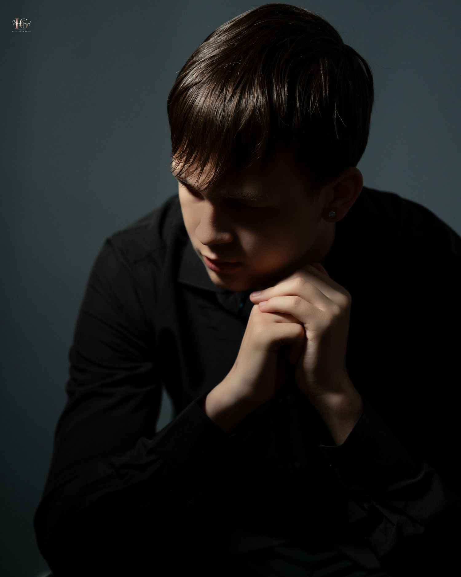 A dark moody portrait series showing a person in shadows resting their head on their hand in contemplative poses.