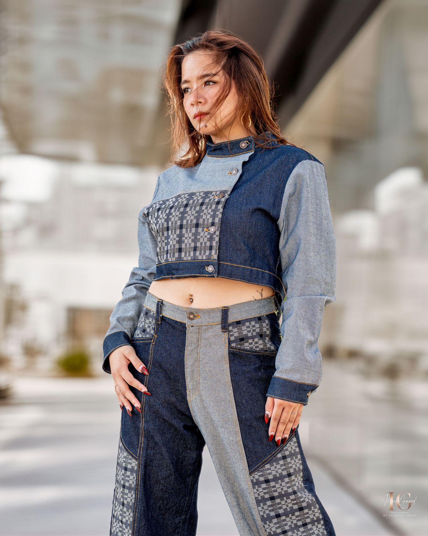 Denim jacket with contrasting patchwork design and gray knit sleeves shown from different angles in fashion photography.