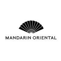 Elegant black Mandarin Oriental hotel logo with fan design on white background.