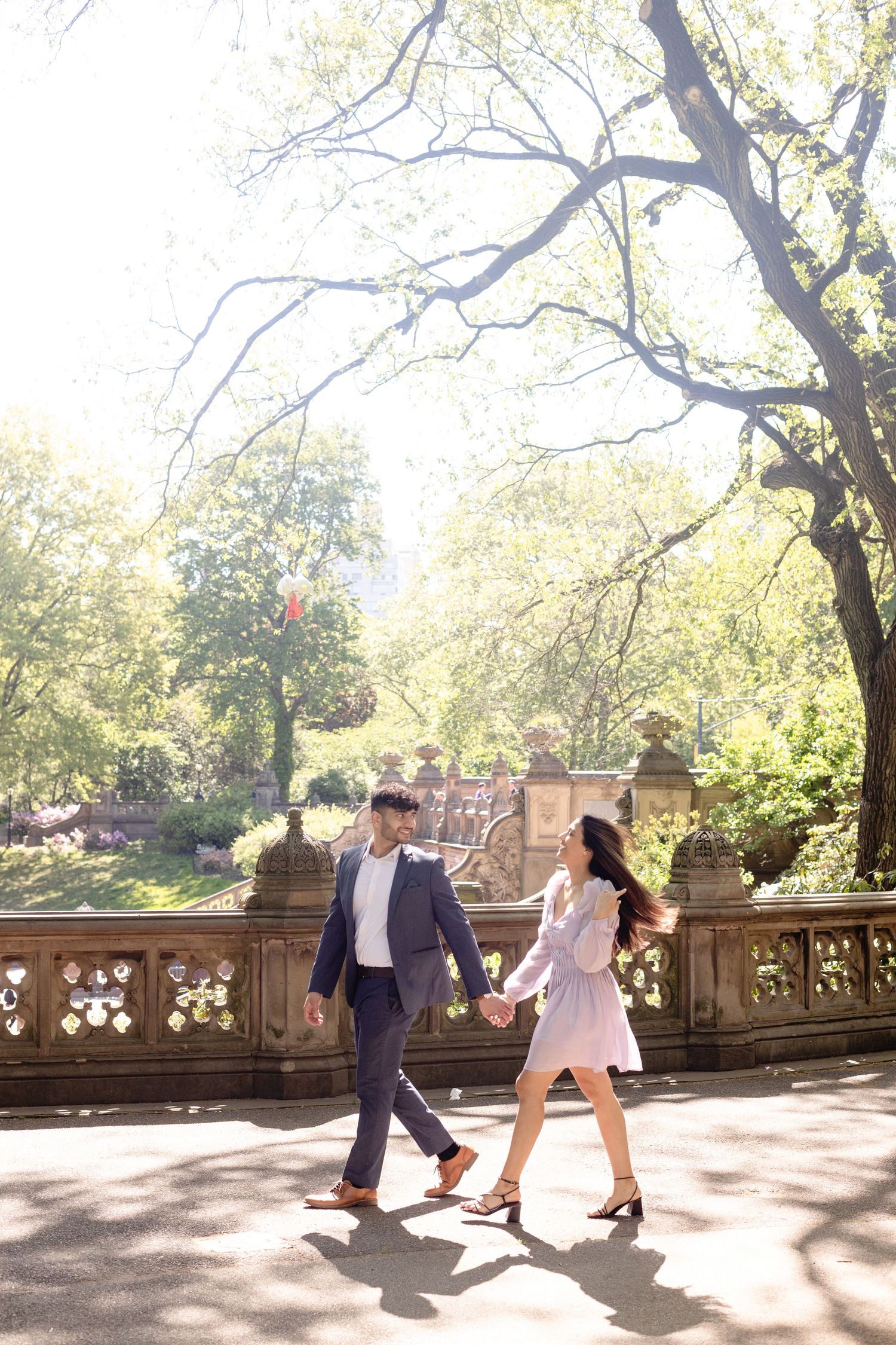 couple walking in central park nyc