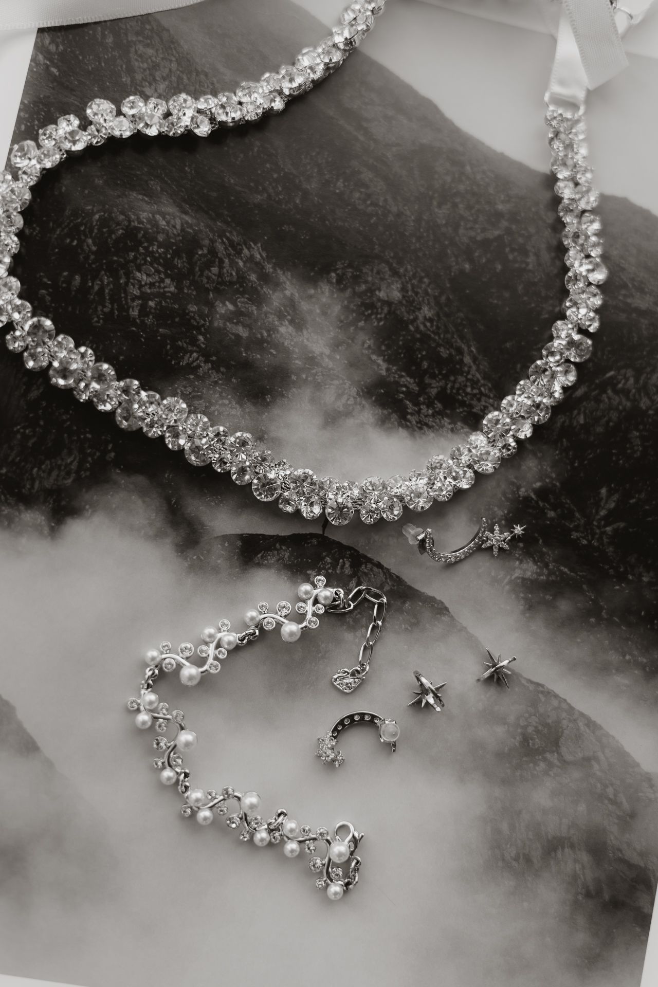 Microscopic view of delicate ice crystals forming intricate patterns in black and white.Wedding details shoot at Shangri-La Toronto