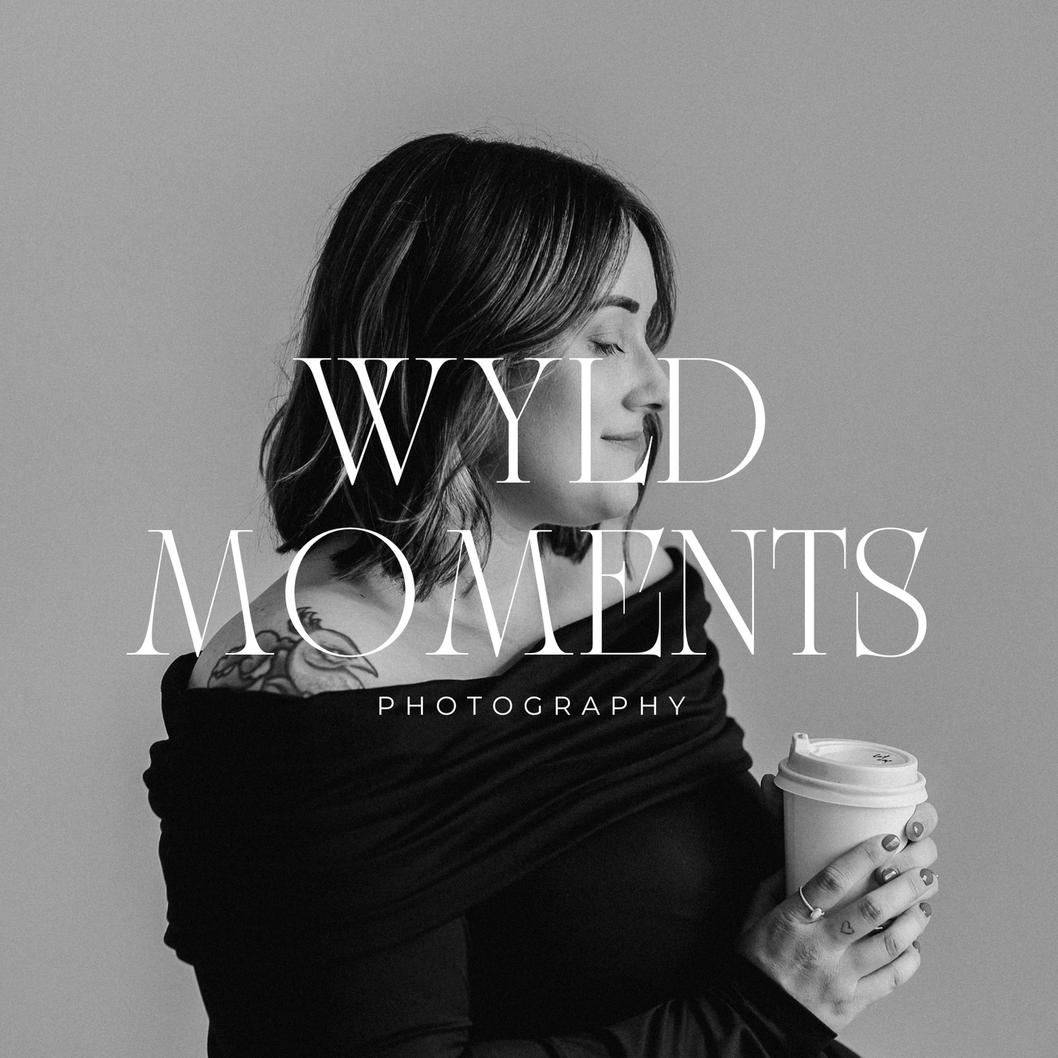 Black and white photo of a woman holding a coffee cup, overlaid with Wyld Moments Photography logo text.