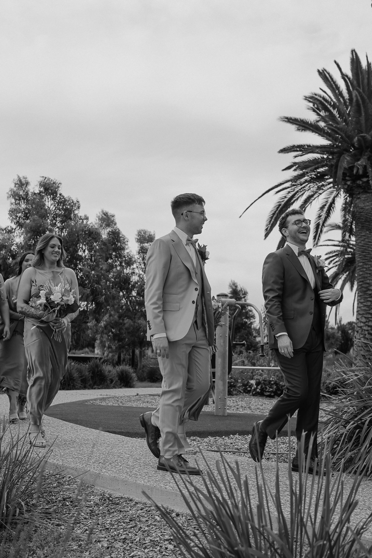 Black and white photo sequence showing guests mingling at an outdoor garden party with palm trees in the background.