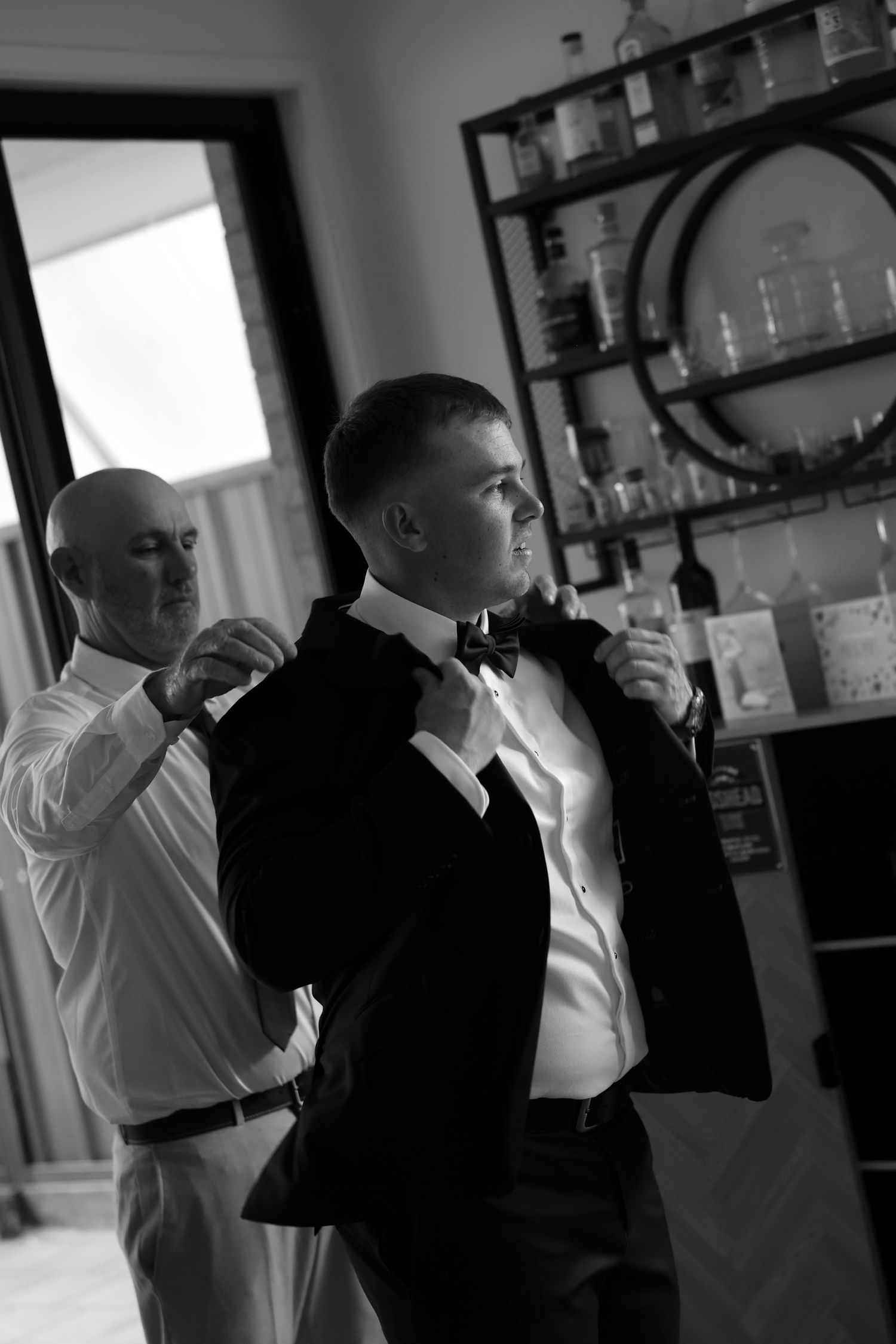A sequence of black and white photos showing people in formal attire drinking from glasses.