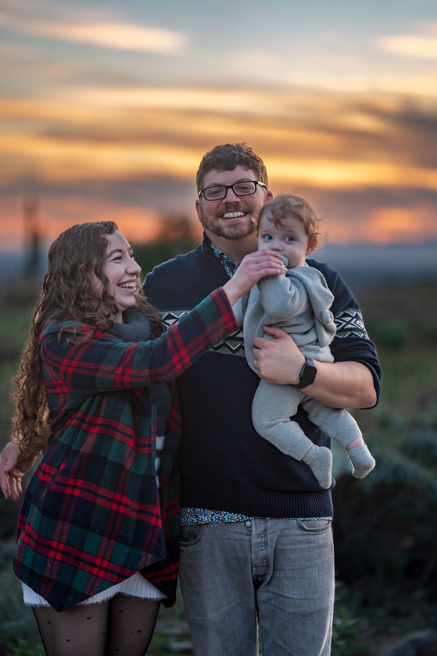 Candid family photos captured during golden hour showing playful interactions.
