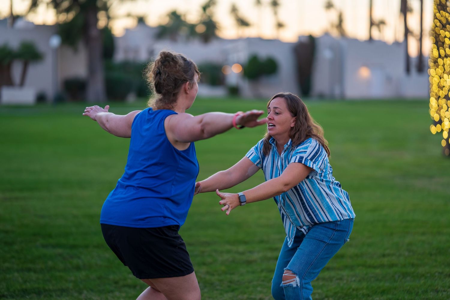 Candid shots of family members playing and laughing together at sunset.