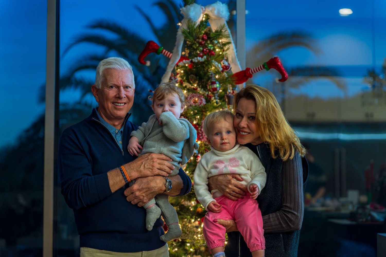 A festive holiday scene with a decorated Christmas tree and twinkling lights.