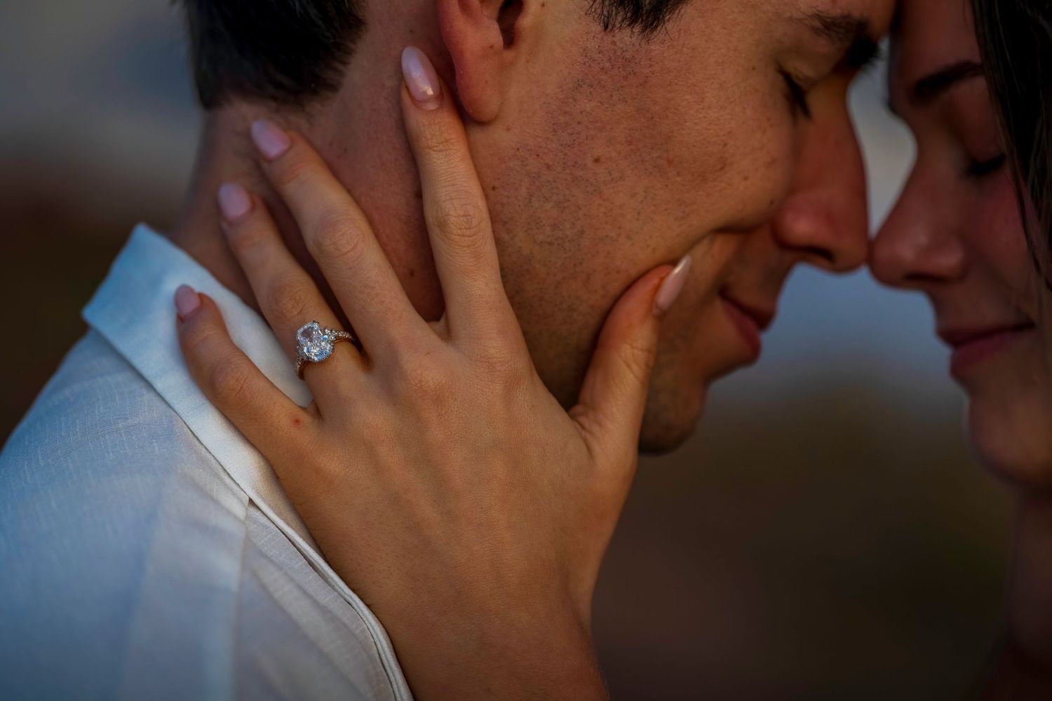 Close-up shot of gentle caress during an intimate moment.