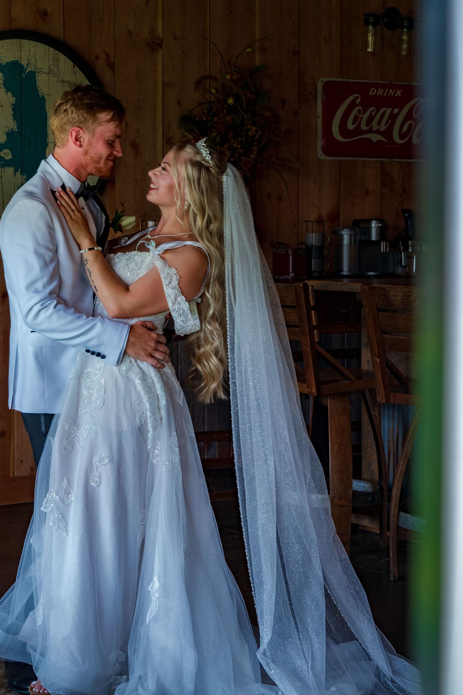 Wedding dance sequence in rustic barn with vintage decorations.